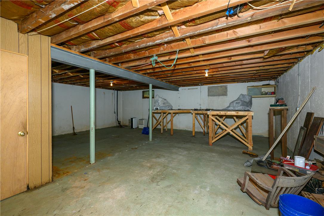 2516 Rachael Lane Orefield, PA 18069 - Photo 29 of 45 A utilitarian basement with concrete flooring and exposed ceiling beams offers a blank canvas for future customization.
