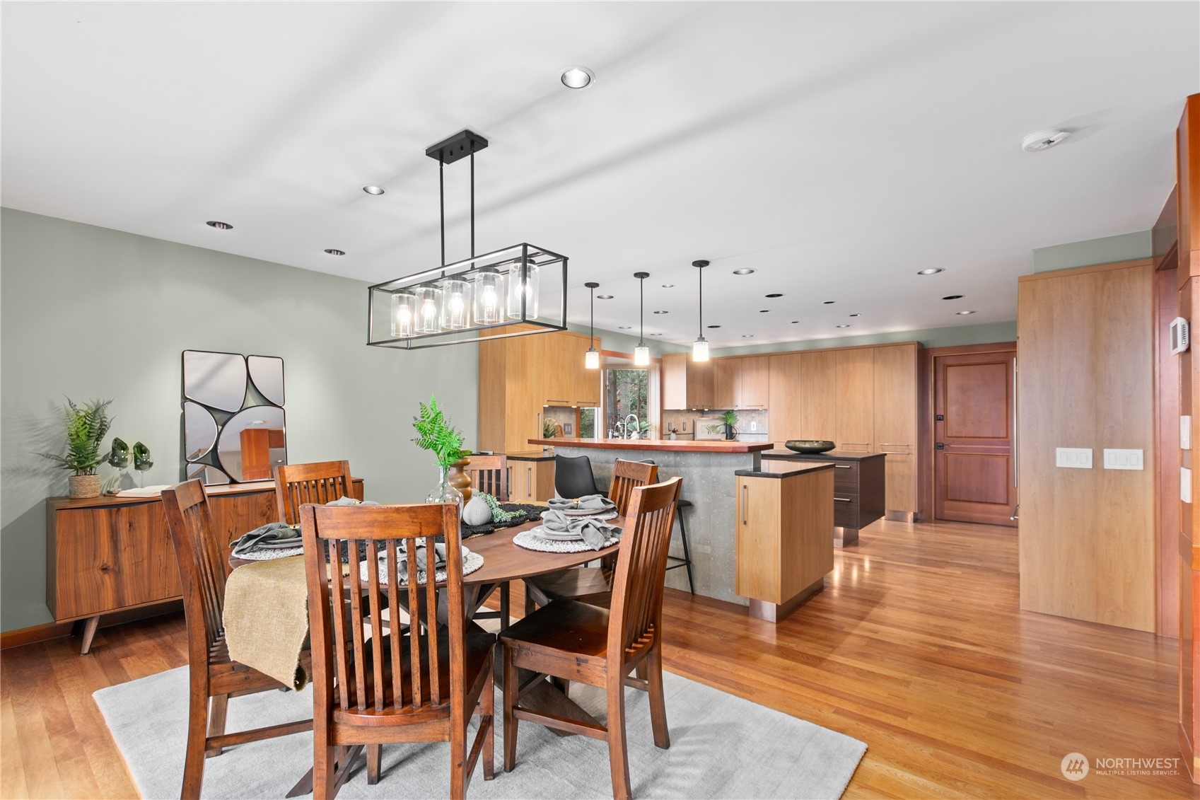 629 Fieldston Road Bellingham, WA 98225 - Photo 12 of 40 a view of a dining room with furniture window and wooden floor