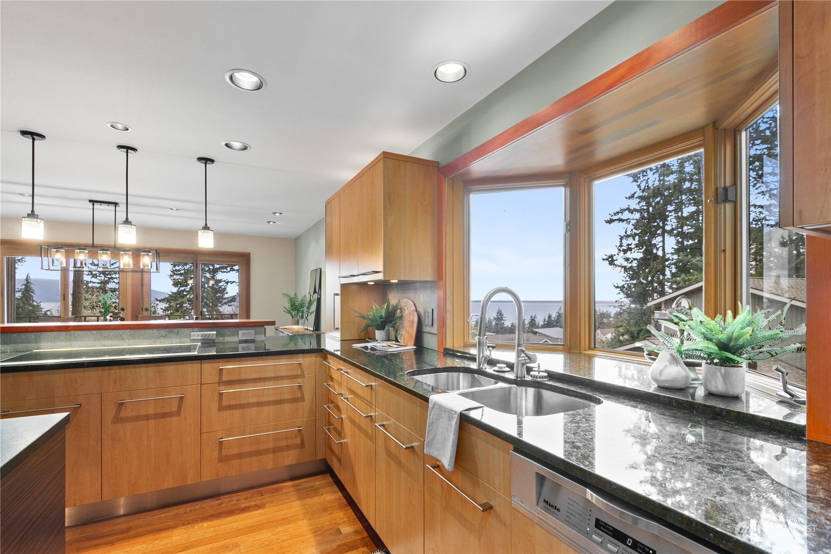 629 Fieldston Road Bellingham, WA 98225 - Photo 16 of 40 a large kitchen with granite countertop a large window and a counter space