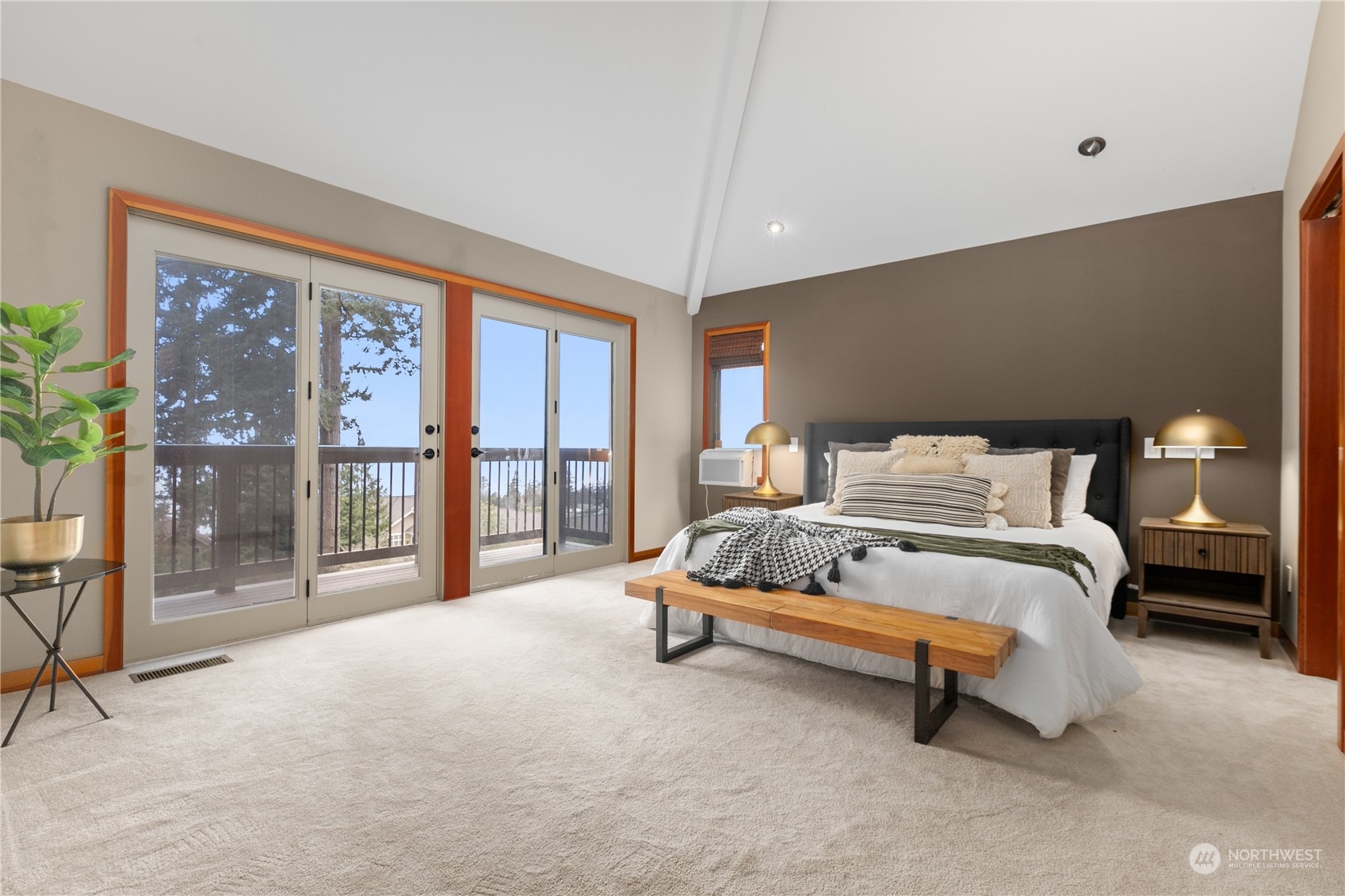 629 Fieldston Road Bellingham, WA 98225 - Photo 23 of 40 a bed sitting in a spacious bedroom next to a window