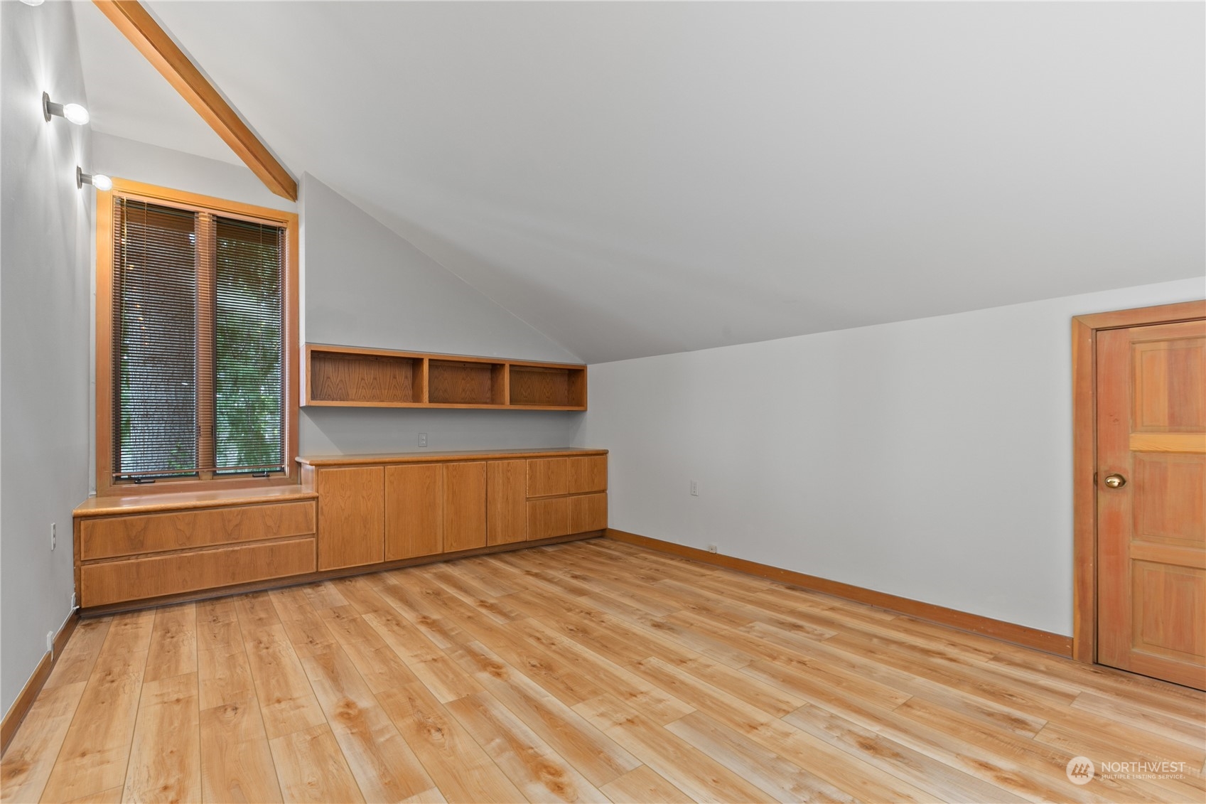 629 Fieldston Road Bellingham, WA 98225 - Photo 35 of 40 a view of an empty room with wooden floor and a window