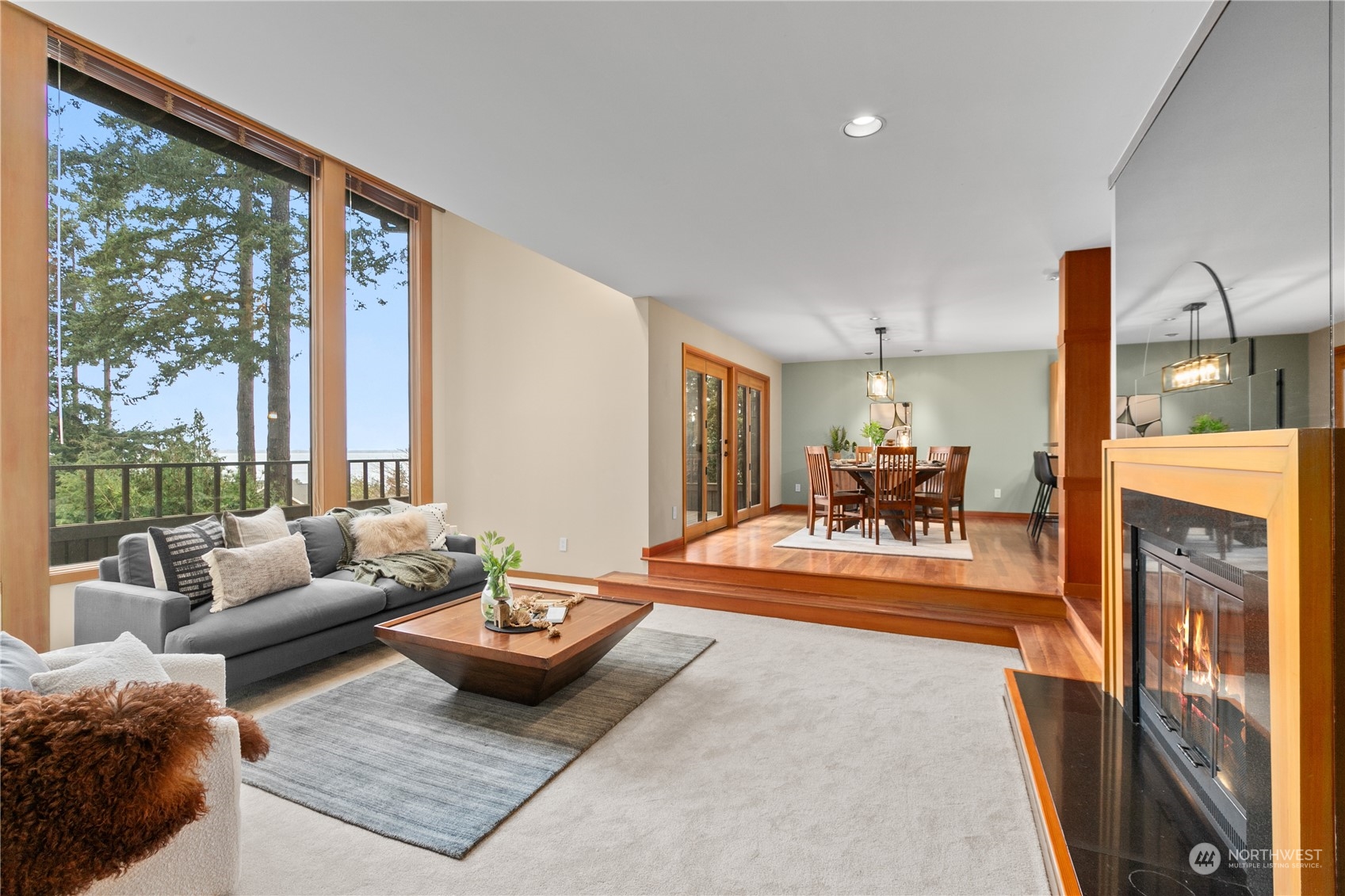 629 Fieldston Road Bellingham, WA 98225 - Photo 7 of 40 a living room with furniture and a floor to ceiling window