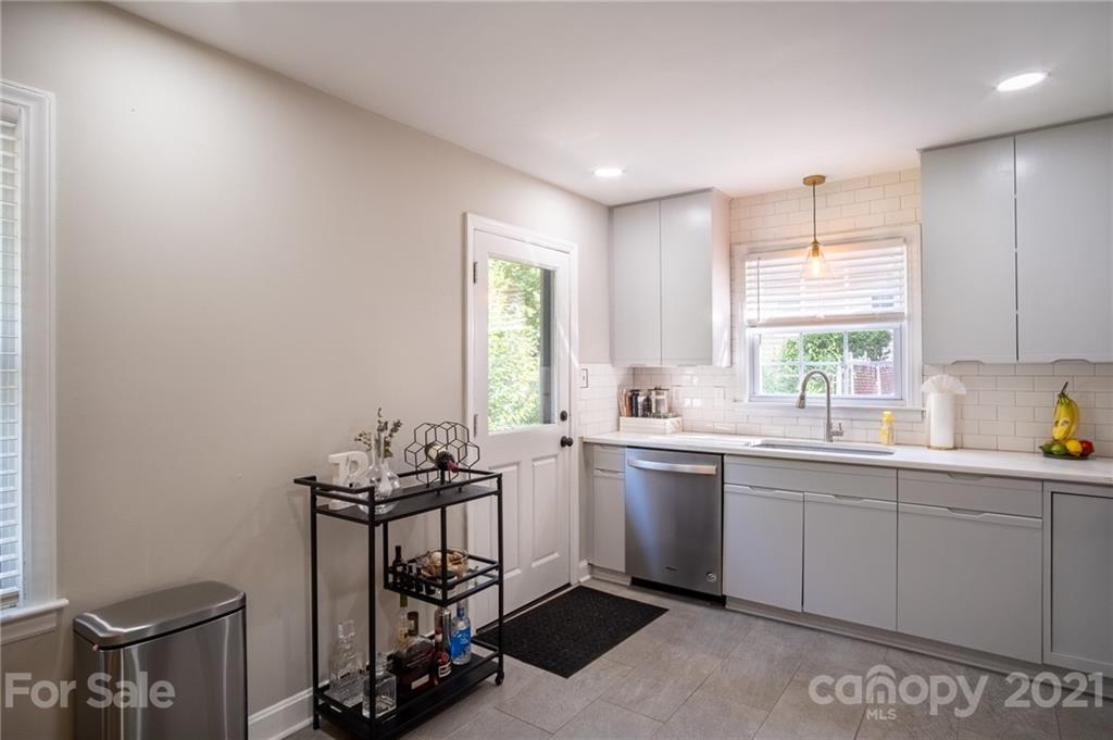 5619 Londonderry Road Charlotte, NC 28210 - Photo 8 of 23 a view of a kitchen with sink cabinets and window