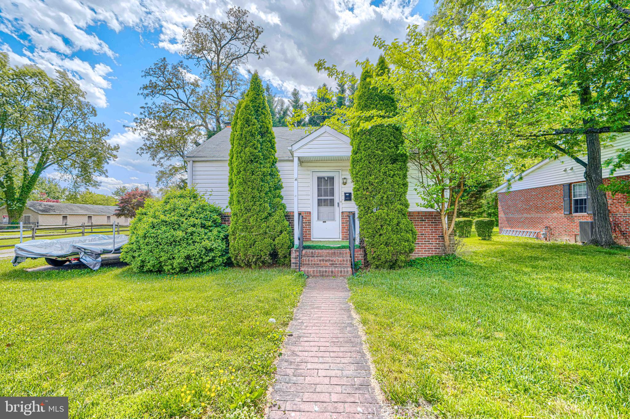 502 Grovethorn Road Middle River, MD 21220 - Photo 17 of 20 a front view of a house with garden