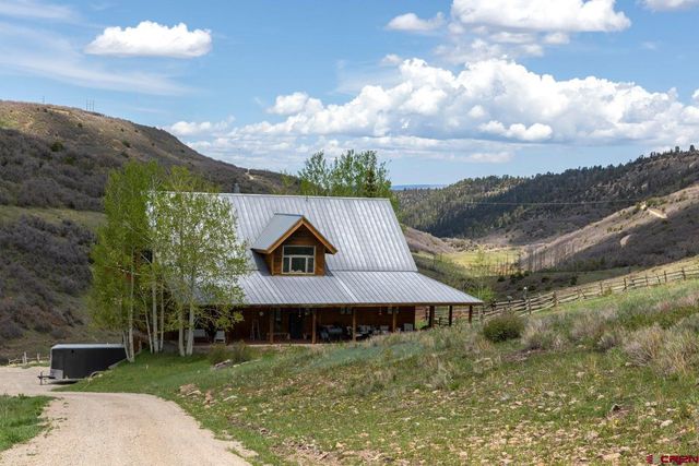 a view of a lake with mountains in the background