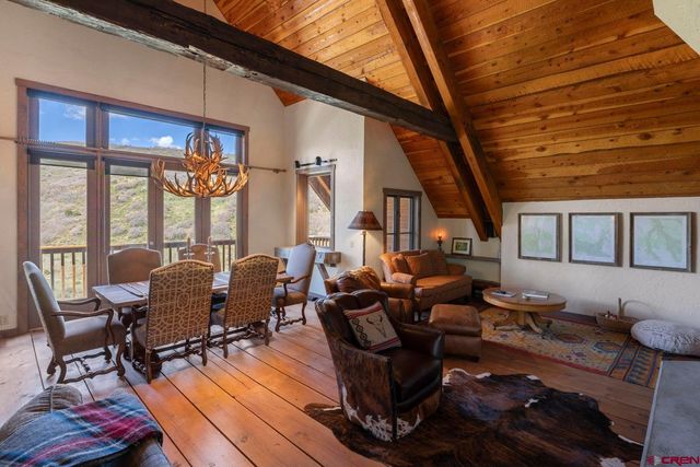 a living room with furniture or couch and a table