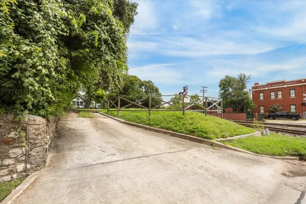 a view of a street with a houses