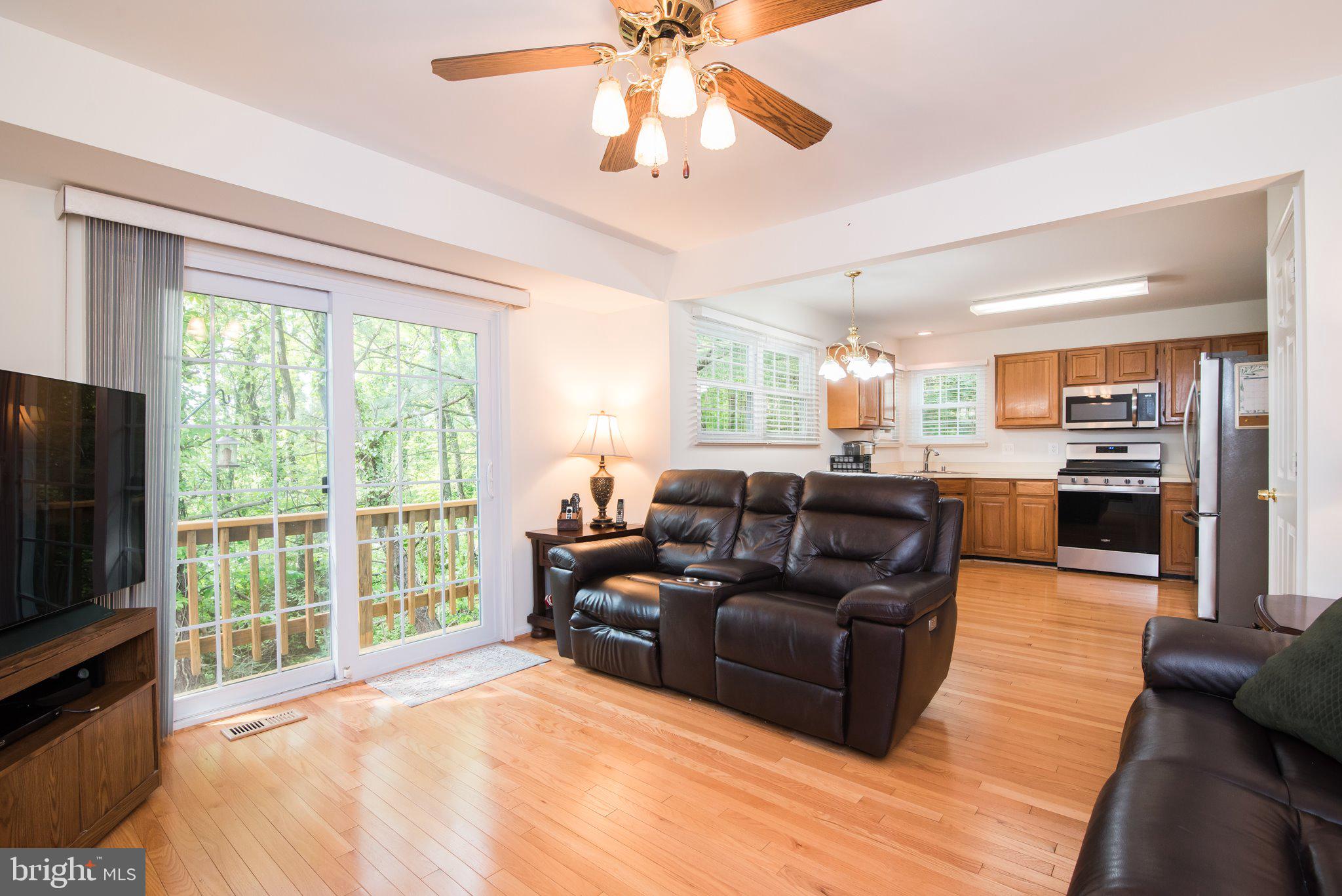 320 Deer Path Avenue Southwest Leesburg, VA 20175 - Photo 14 of 32 Slider doors leading to the side deck