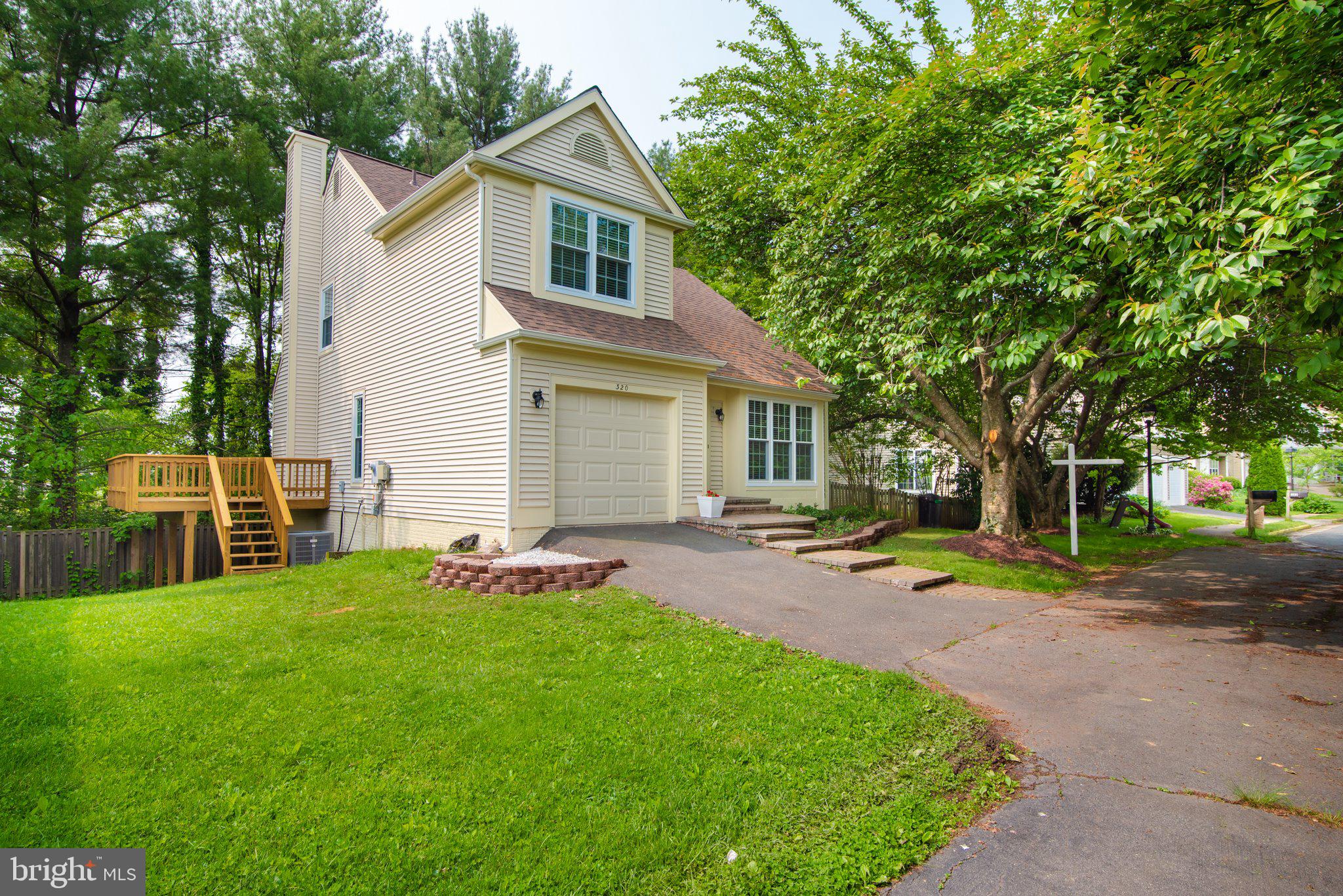 320 Deer Path Avenue Southwest Leesburg, VA 20175 - Photo 3 of 32 One car garage and driveway for parking
