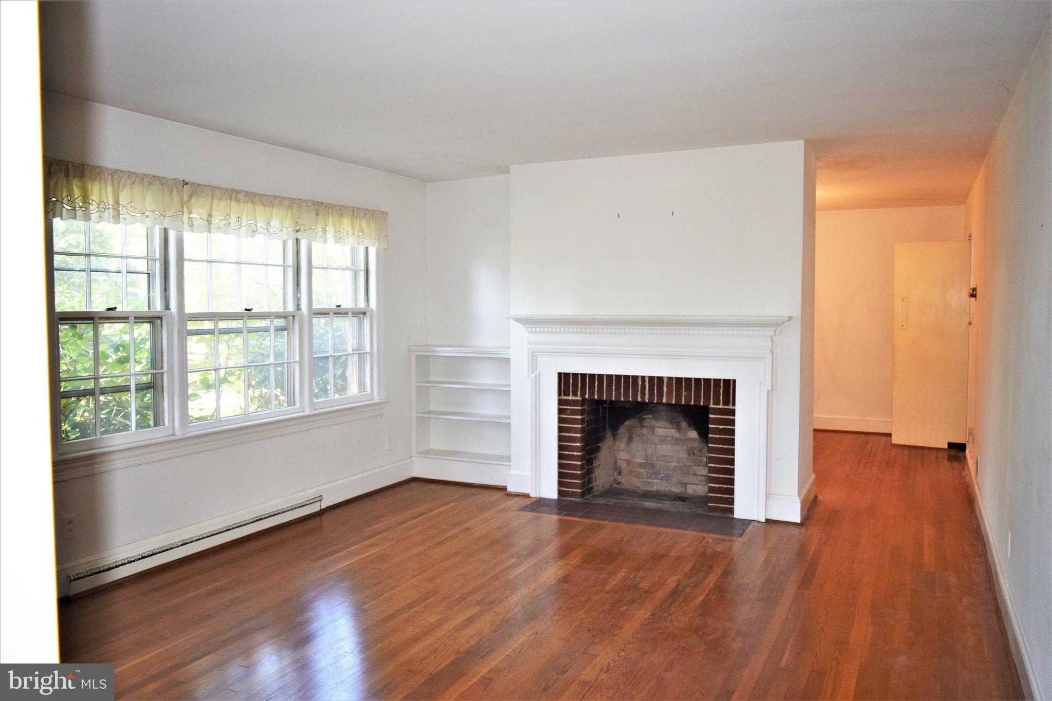 12394 Metlock Road Culpeper, VA 22701 - Photo 8 of 14 Living room with fireplace
