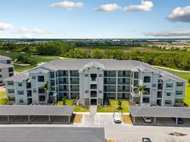 a view of a building with a ocean view