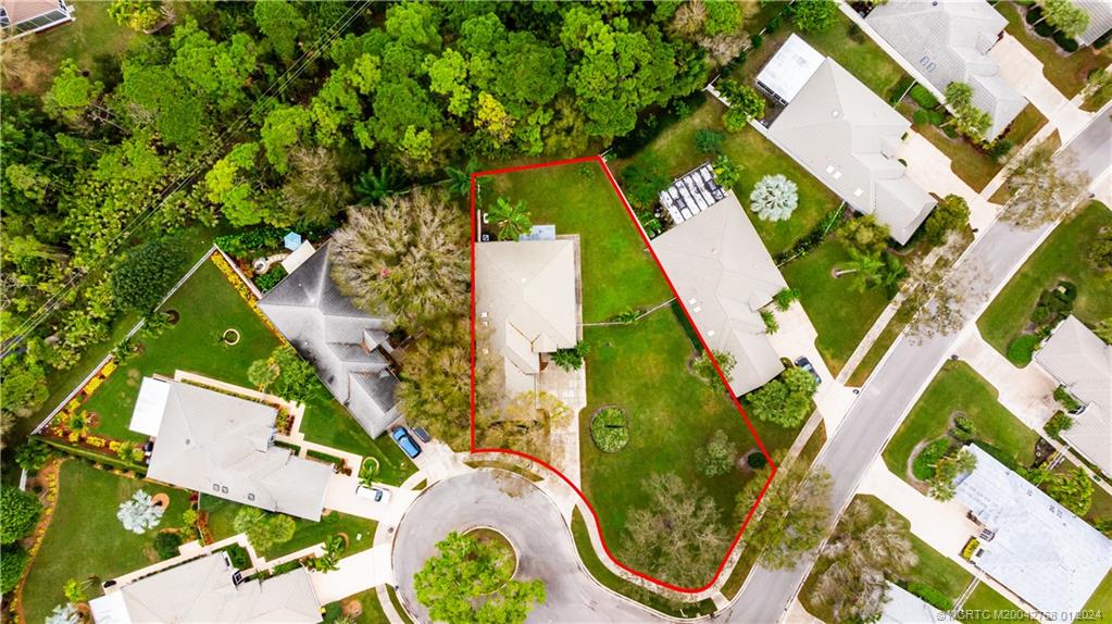 7199 Southeast Bitterroot Circle Hobe Sound, FL 33455 - Photo 6 of 28 an aerial view of a house