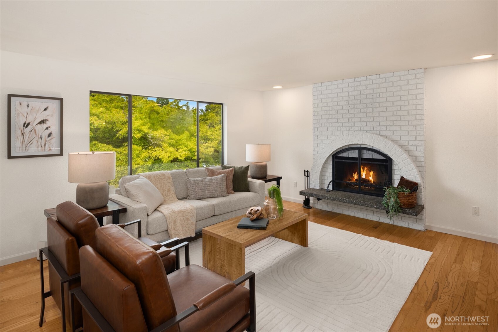 418 212th Street Southwest Bothell, WA 98021 - Photo 6 of 40 a living room with furniture and a fireplace
