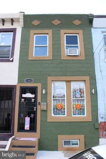 an aerial view of a house with outdoor space