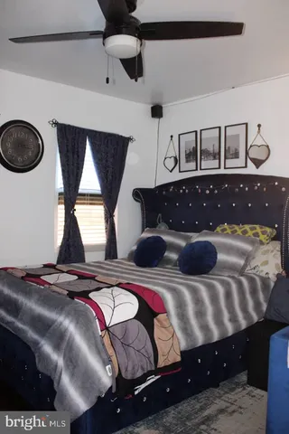 a living room with a bed