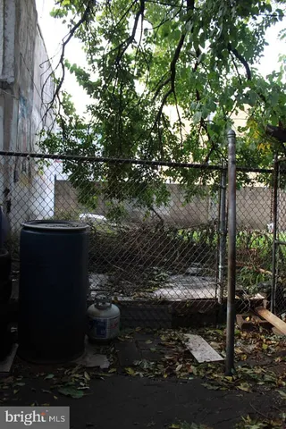 a view of a patio with chair and table