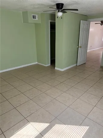 a view of an empty room and utility room
