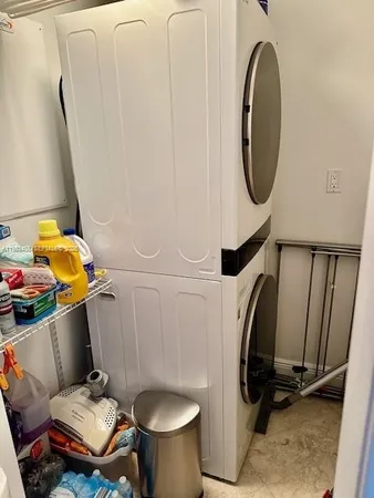 a bathroom with a sink toilet and a mirror