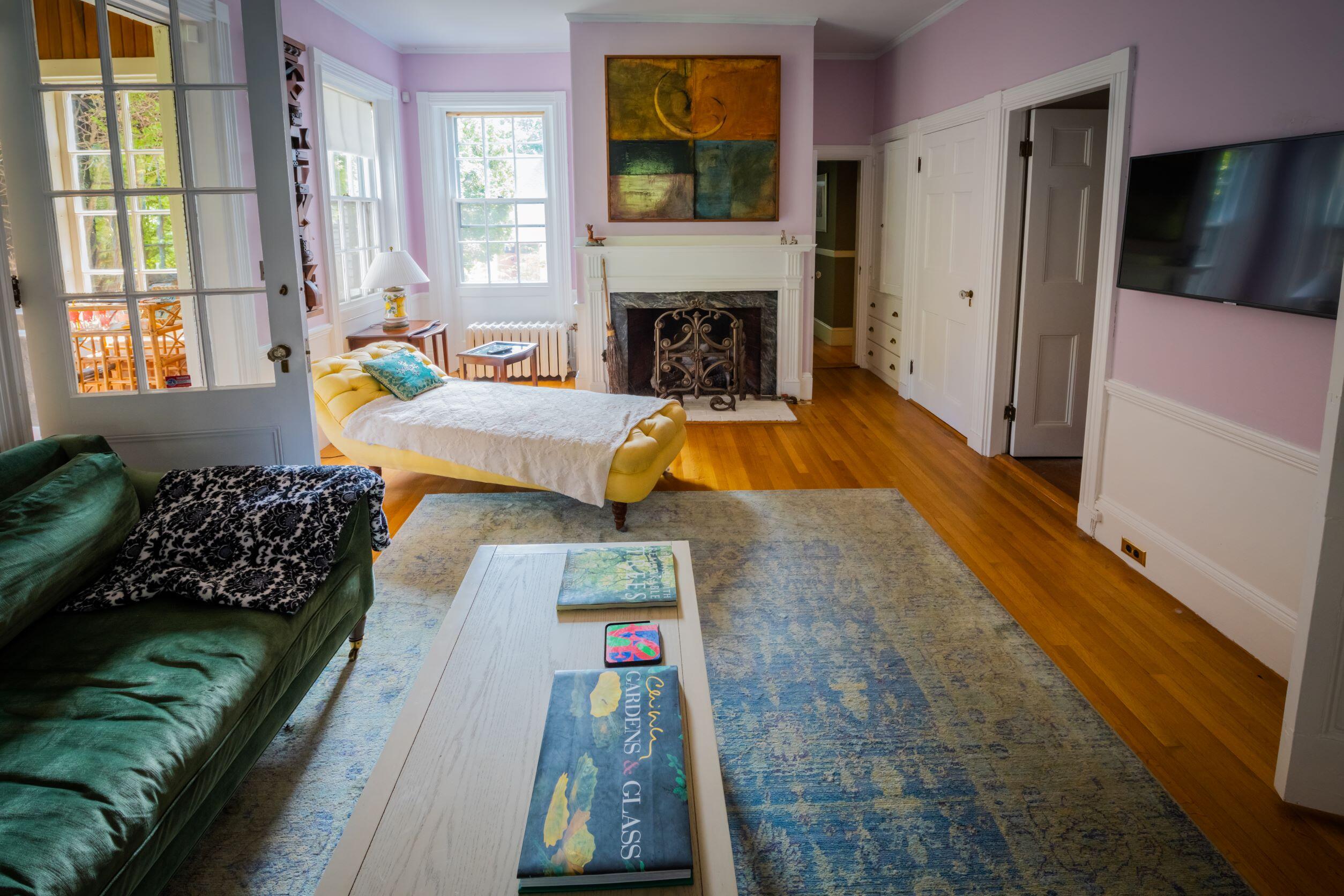 10 East Main Street Ellsworth, ME 04605 - Photo 11 of 45 Gas fireplace in library.