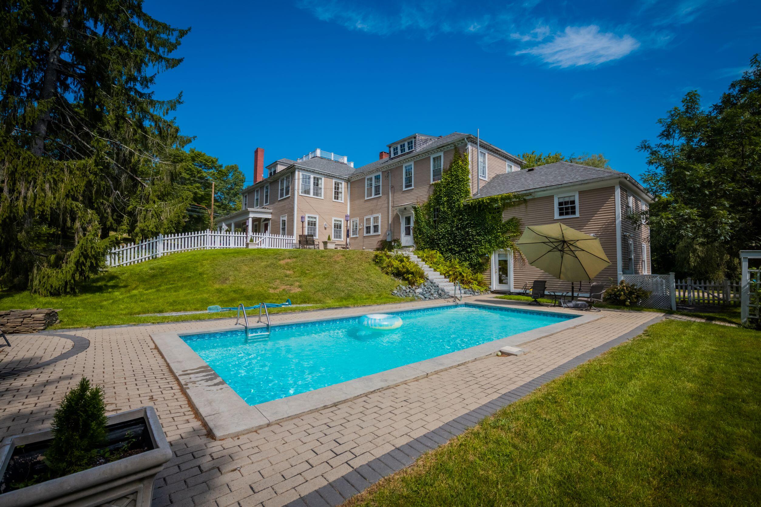 10 East Main Street Ellsworth, ME 04605 - Photo 4 of 45 Back yard, pool & patio.
