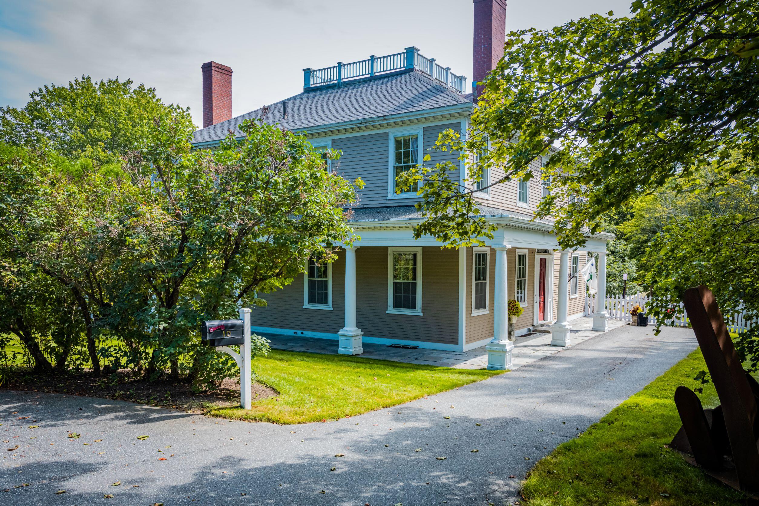 10 East Main Street Ellsworth, ME 04605 - Photo 44 of 45 Front with lilacs.