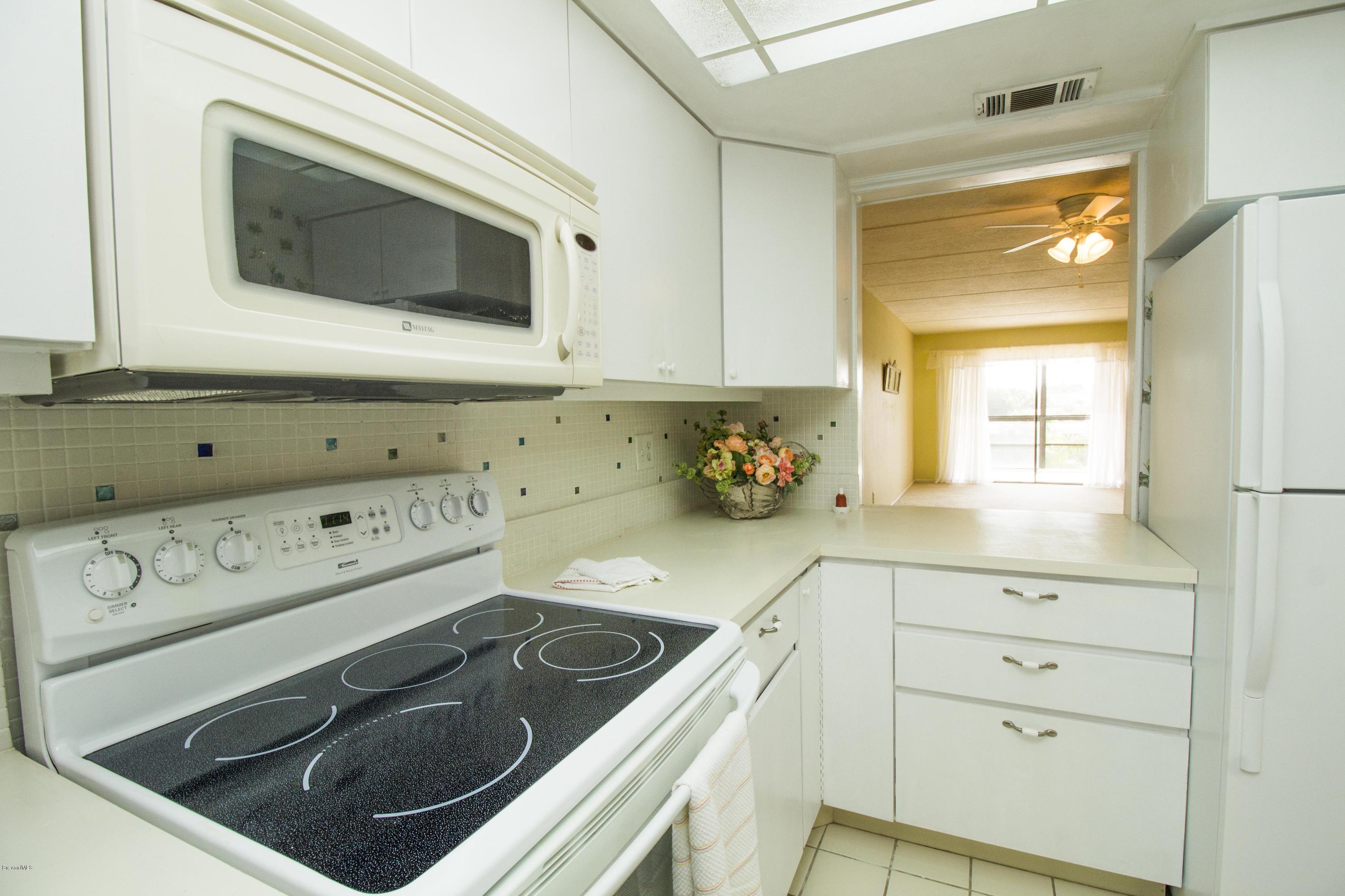 2775 North Wickham Road, Unit 305 Melbourne, FL 32935 - Photo 3 of 17 IMG_7732