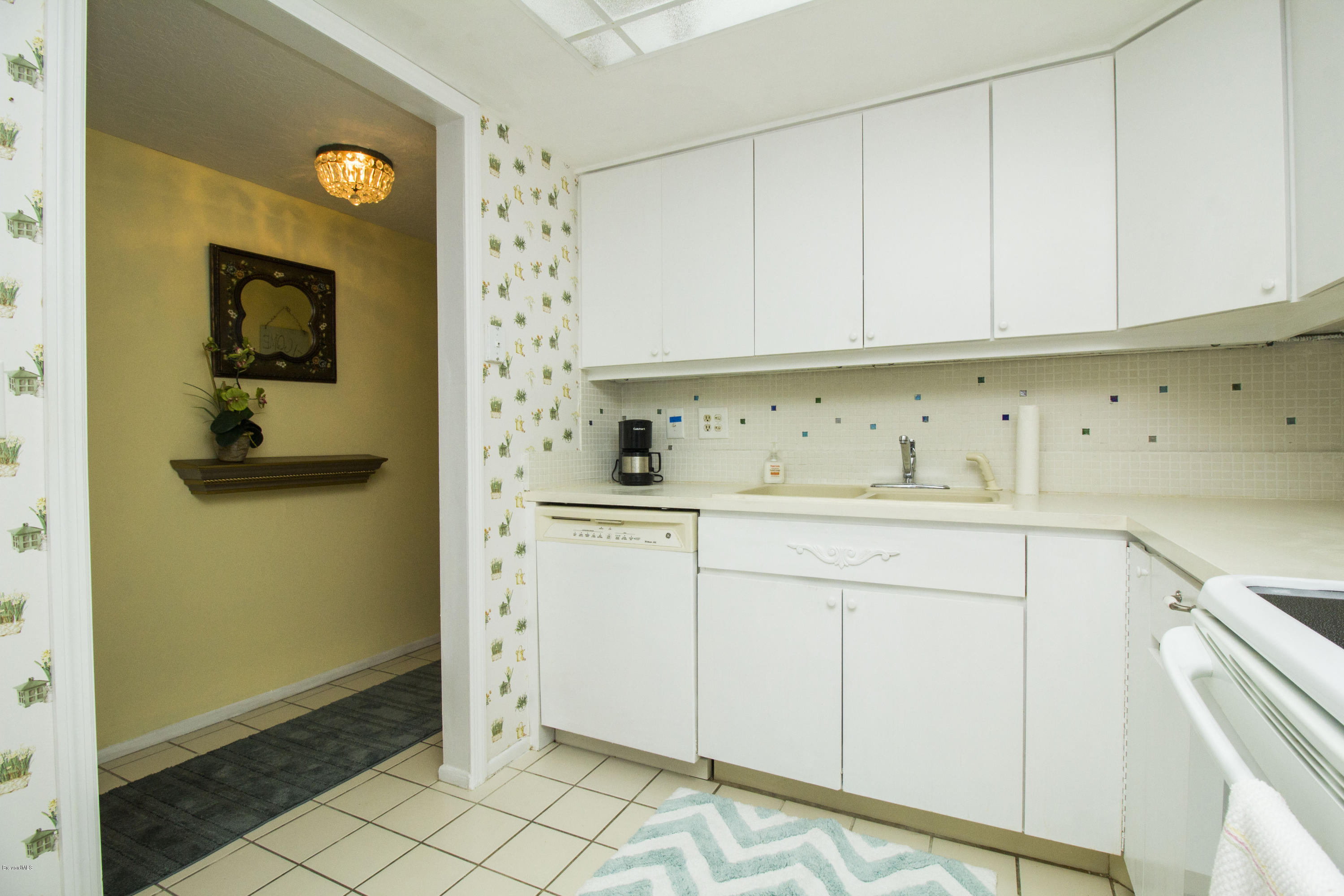 2775 North Wickham Road, Unit 305 Melbourne, FL 32935 - Photo 4 of 17 IMG_7733
