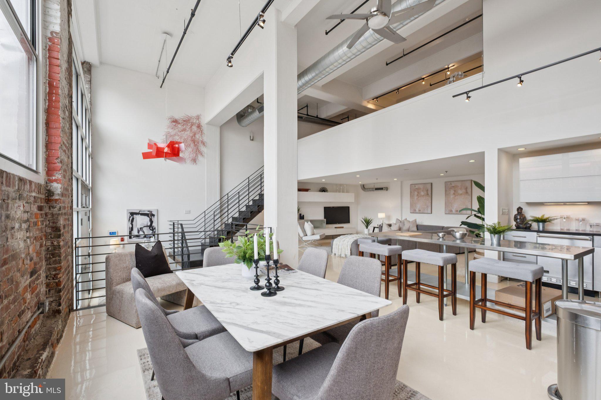 a view of a dining room with furniture