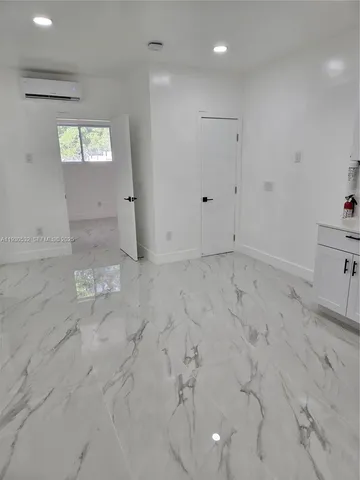 a view of a bathroom with a toilet