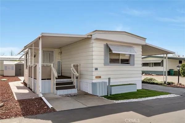 a front view of a house with a garage