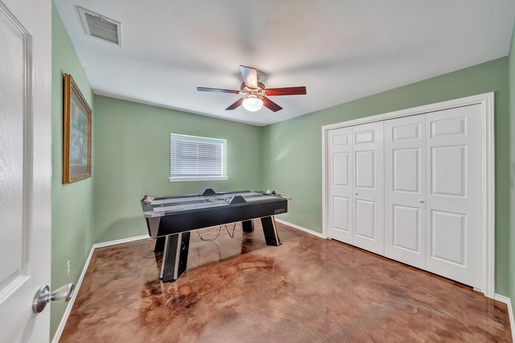 569 Funf Kinder Road Fredericksburg, TX 78624 - Photo 14 of 22 Downstairs BR/Gameroom