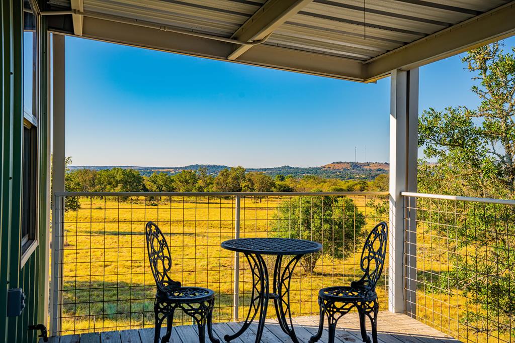 569 Funf Kinder Road Fredericksburg, TX 78624 - Photo 16 of 22 Upstairs Porch View