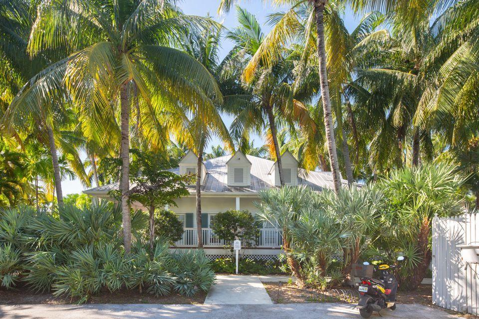 20 Merganser Lane Key West, FL 33040 - Photo 12 of 13 a front view of a house with a yard