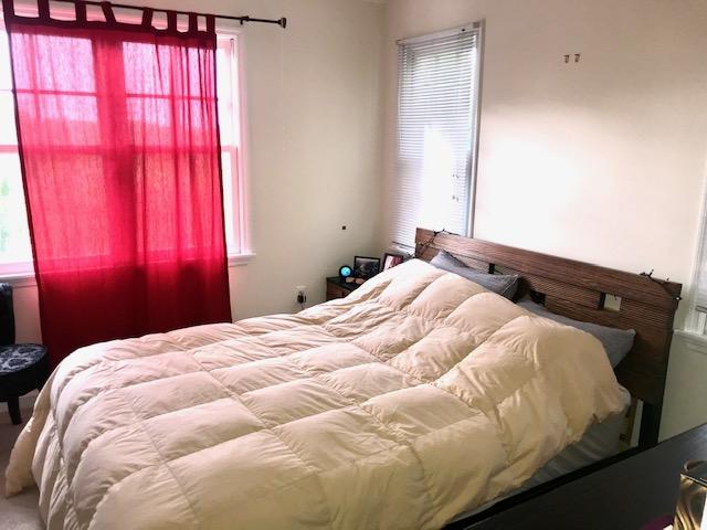 20 Merganser Lane Key West, FL 33040 - Photo 5 of 13 a bedroom with a bed and window