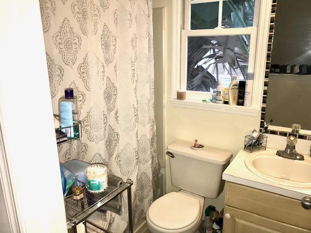 20 Merganser Lane Key West, FL 33040 - Photo 10 of 13 a bathroom with a toilet and a sink