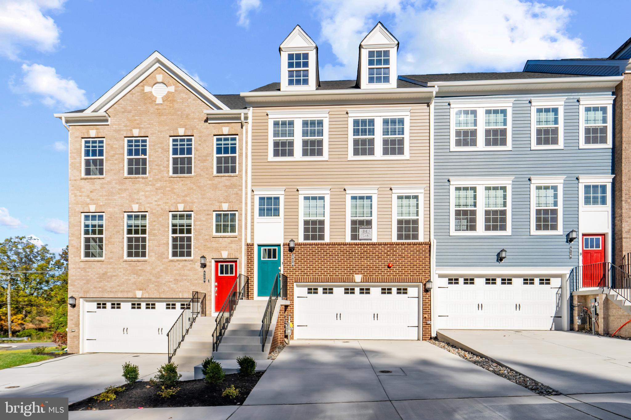 a front view of a building with many windows