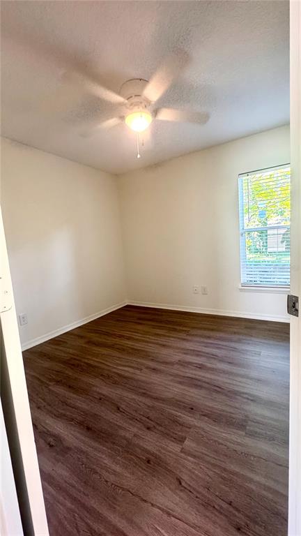1613 Winter Green Boulevard Winter Park, FL 32792 - Photo 11 of 22 a view of empty room with wooden floor and fan