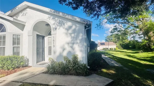 a view of a house with a garden