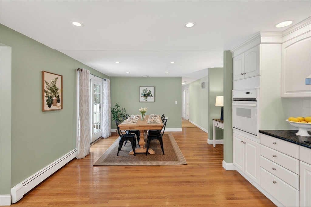 11 Rennie Drive Andover, MA 01810 - Photo 11 of 35 a view of a dining room with furniture and wooden floor