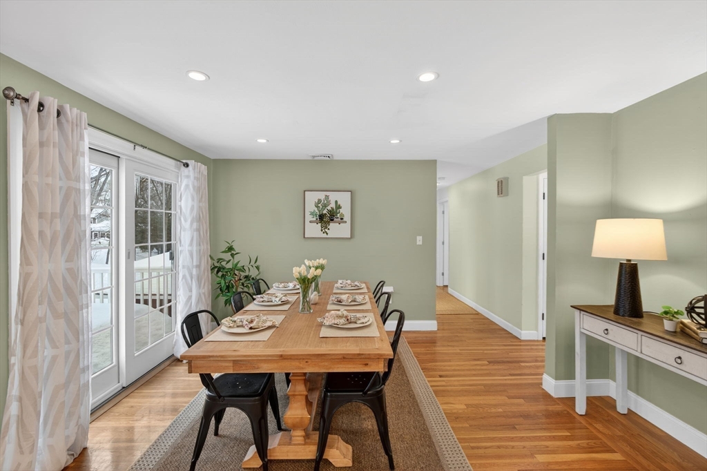 11 Rennie Drive Andover, MA 01810 - Photo 12 of 35 a view of a dining room with furniture window and wooden floor