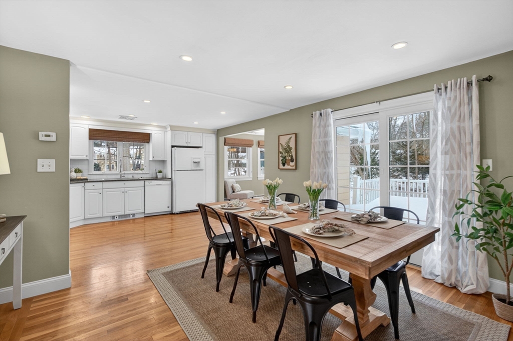 11 Rennie Drive Andover, MA 01810 - Photo 13 of 35 a view of a dining room with furniture and wooden floor