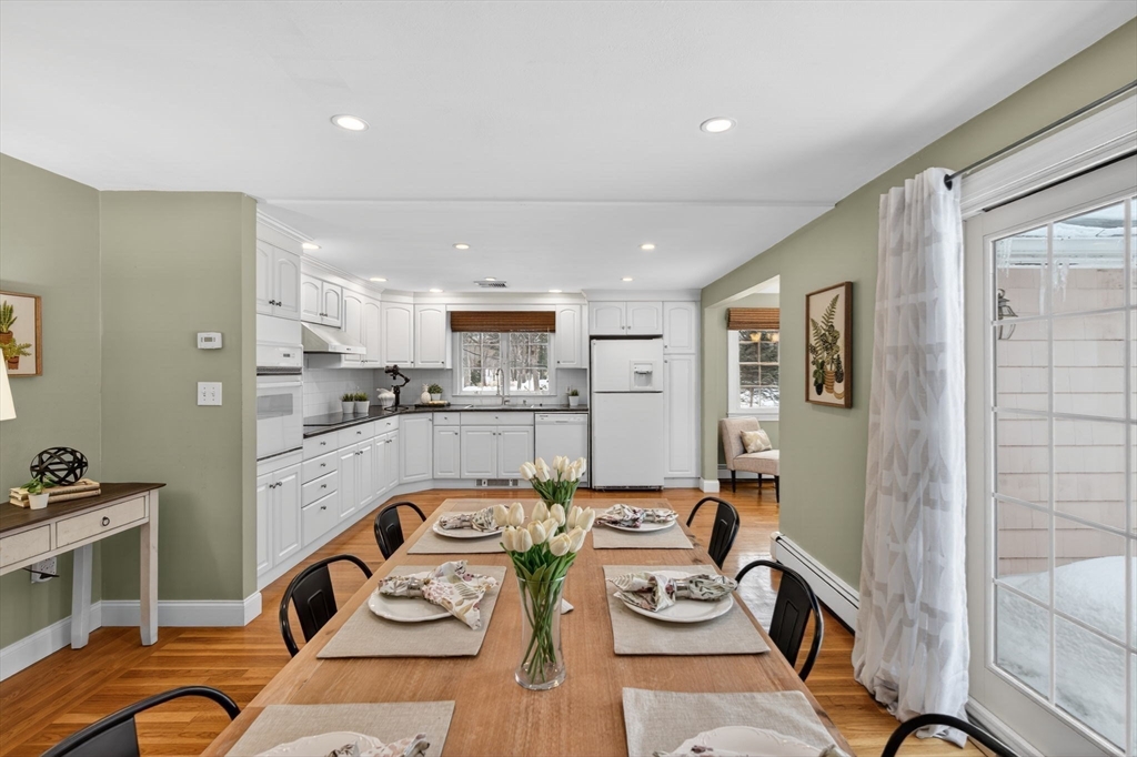 11 Rennie Drive Andover, MA 01810 - Photo 14 of 35 a living room with furniture and kitchen view