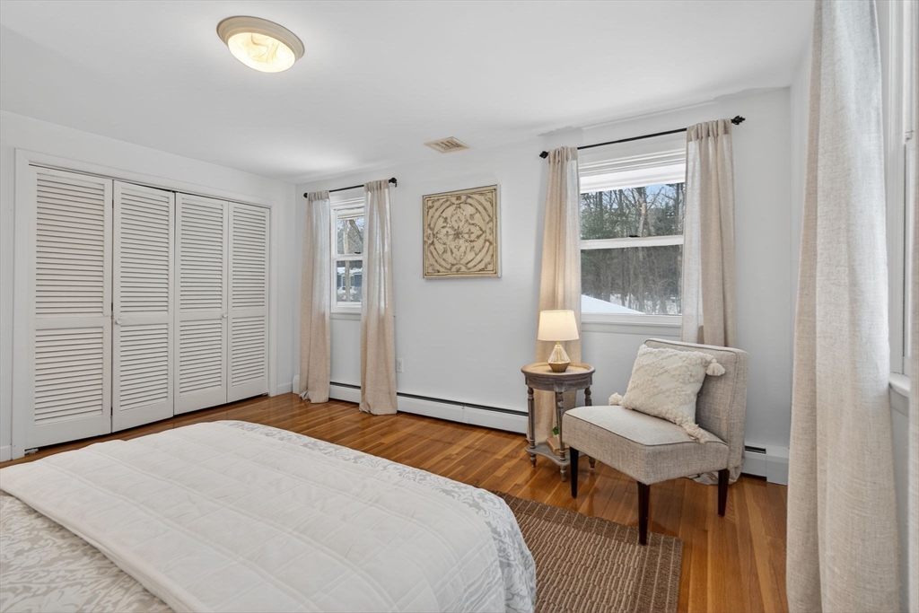 11 Rennie Drive Andover, MA 01810 - Photo 17 of 35 a bedroom with a bed and a window