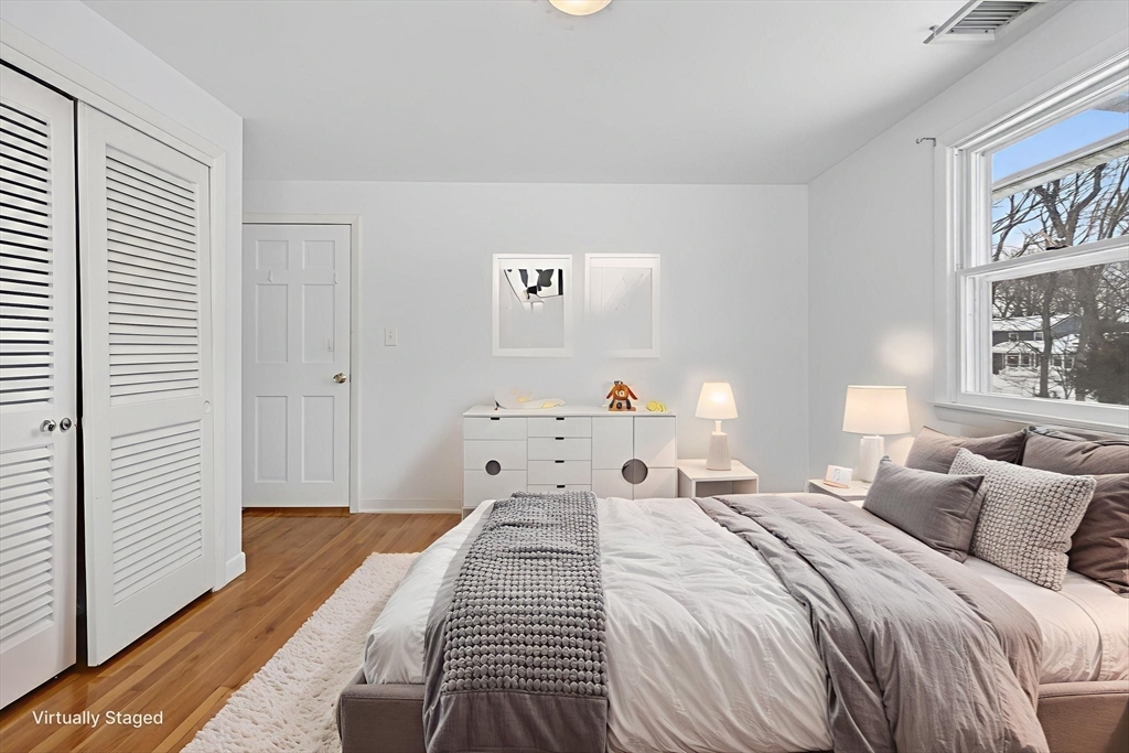 11 Rennie Drive Andover, MA 01810 - Photo 21 of 35 a bedroom with a bed and a night stand