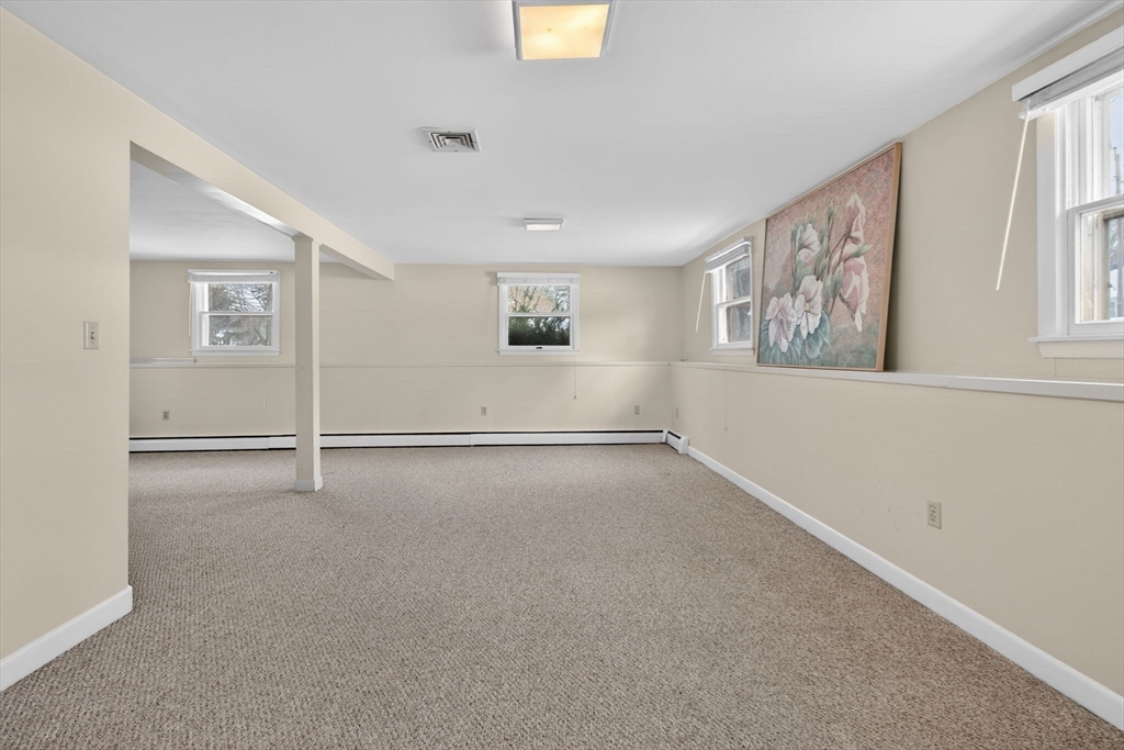 11 Rennie Drive Andover, MA 01810 - Photo 28 of 35 an empty room with windows and closet