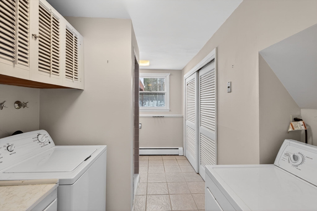 11 Rennie Drive Andover, MA 01810 - Photo 31 of 35 a bathroom with a sink and toilet