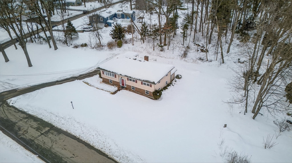 11 Rennie Drive Andover, MA 01810 - Photo 34 of 35 a white bath tub sitting in a snow