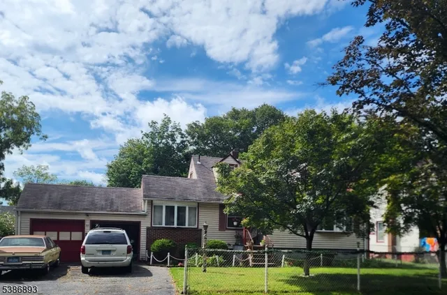 a car parked in front of a house