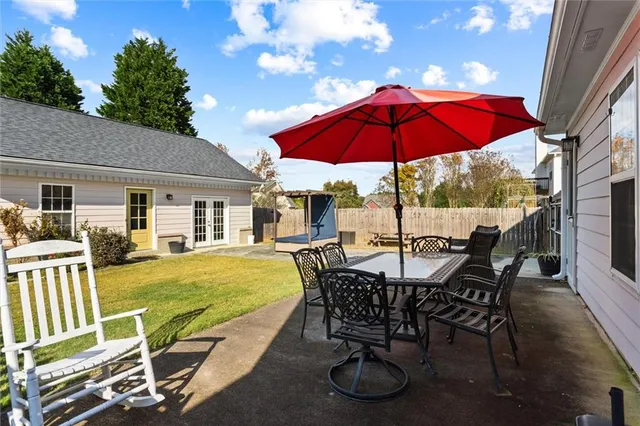 a living room with furniture and a couch