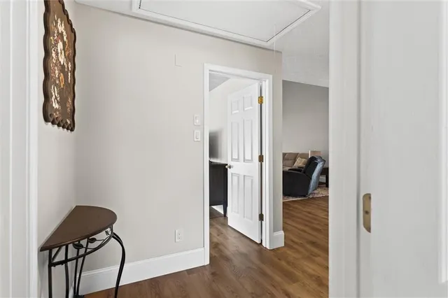 a large kitchen with stainless steel appliances granite countertop a stove and a sink